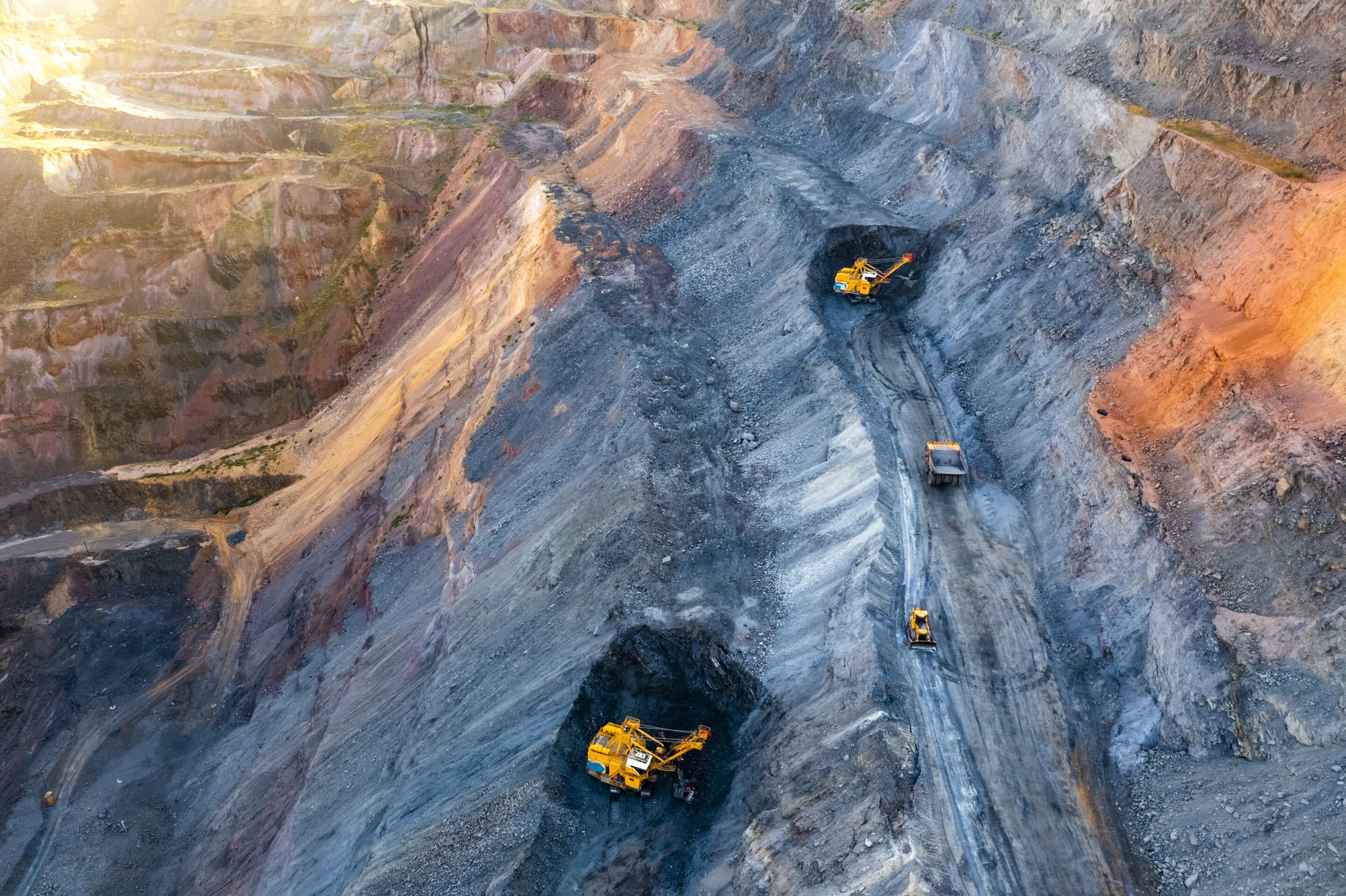 Aerial view of an open pit of iron ore. Resource mining
